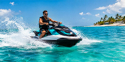 Man riding a jet ski.